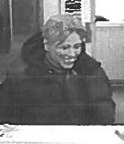 Ladrón con máscara de Hillary Clinton. Foto: Cámara de Seguridad del Banco Wachovia.