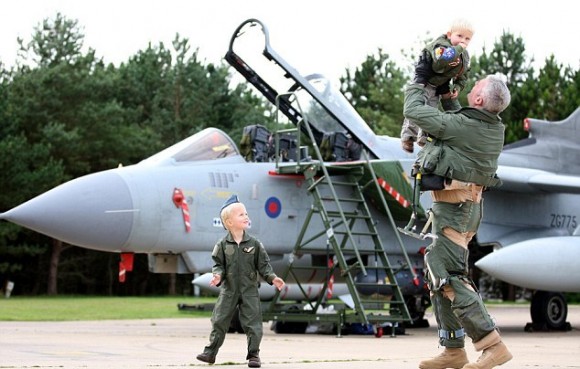 daddy-boys-wing-commander-andy-turk-from-9-squadron-is-greeted-by-his-two-children-on-his-return-to-raf-marham-kings-lynn-after-returning-from-service-in-libya1