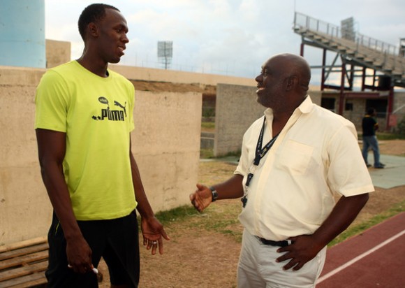 Glen Mills y Usain Bolt.