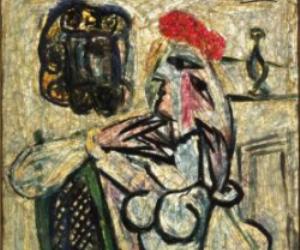 Obra conocida como "Mujer sentada con sombrero rojo", elaborada en vidrio por el pintor español Pablo Picasso
