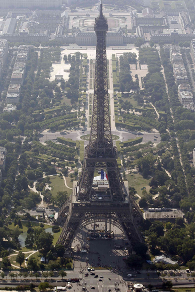 An aerial view shows the Eiffel Tower and the Champ de Mars in Paris