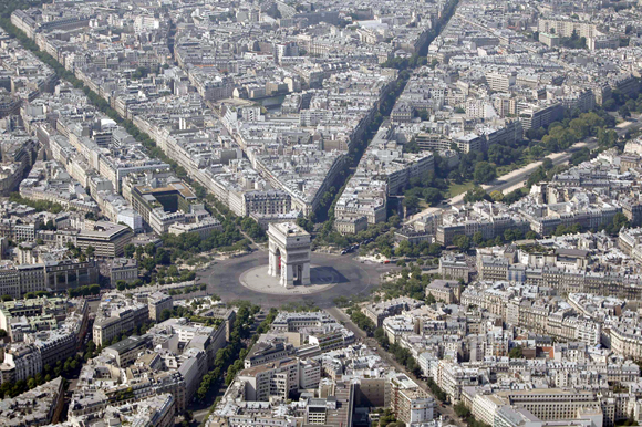 An aerial view shows the Arc de Triomphe and rooftops of residential buildings in Parisin Paris