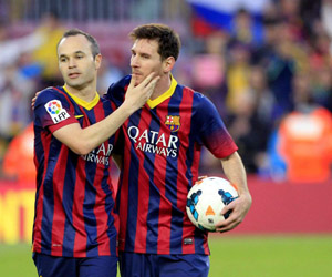 Iniesta y Messi. Foto: EFE.