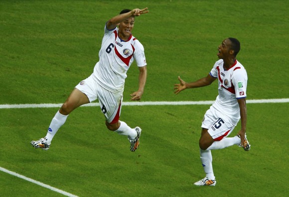 Costa Rica's Duarte celebrates scoring the second goal against Uruguay with teammate Diaz during their 2014 World Cup Group D soccer match at the Castelao arena in Fortaleza
