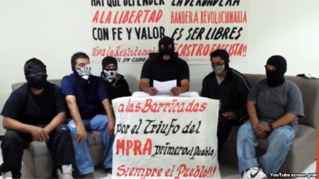 Encapuchados financiados por el DDC que ocuparon violentamente las oficinas de PL en México.