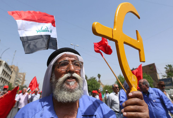 Seguidores del Partido Comunista iraquí durante la celebración del Día del Trabajador en Bagdad, Iraq.