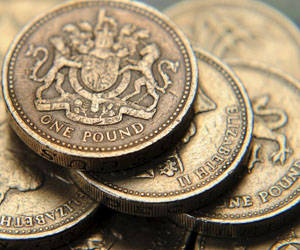 File photograph of a pile of one pound coins in central London