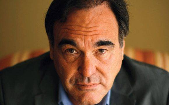 Director of the movie "W." Oliver Stone poses for a portrait in Los Angeles October 7, 2008. Stone's film portrait of U.S. President George W. Bush was always going to be controversial given the director's liberal leanings, so he decided to open "W." in U.S. theaters less than three weeks before Americans select their next president -- a calculated move aimed at prodding voters to think about the past eight years and the future. Picture taken October 7, 2008. REUTERS/Mario Anzuoni (UNITED STATES)