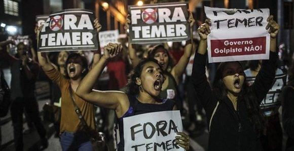 Manifestantes salen a las calles de Brasil para protestar contra Temer. 