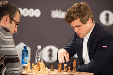 Leinier Domínguez y Magnus Carlsen. Foto tomada de ZImbio.