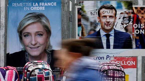 Macron es favorito, pero algunos expertos consideran que Le Pen podría sorprender con el voto de "los indecisos". Foto: Reuters.