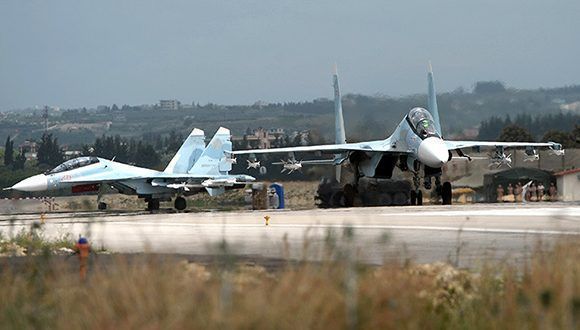 Cazas rusos Su-30 en la base aérea de Hmeimim, Siria. Foto: Maxim Blinov/ Sputnik.