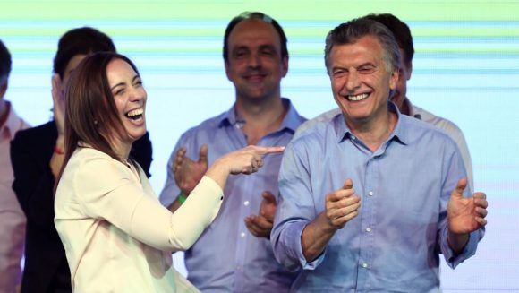 Argentina's President Mauricio Macri and Buenos Aires' governor Maria Eugenia Vidal laugh at their campaign headquarters in Buenos Aires, Argentina October 22, 2017. REUTERS/Marcos Brindicci - RC18000FA810