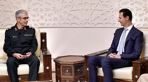 El presidente sirio, Bachar Al-Assad, durante su reunión con el jefe del Estado Mayor iraní, Mohamed Husein Bagheri. Foto: SANA.
